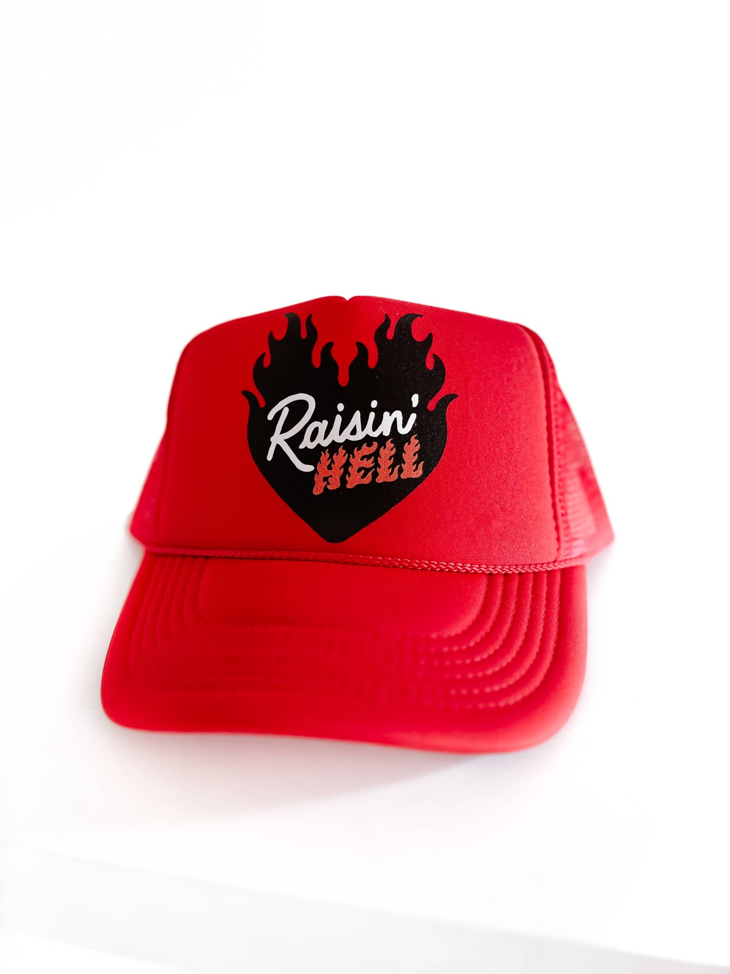 Raisin’ Hell Trucker Hat